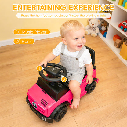 A happy toddler playing with the pink Mercedes-Benz Unimog push car indoors. The image highlights the interactive steering wheel with a built-in music player and horn button for an entertaining sensory experience.