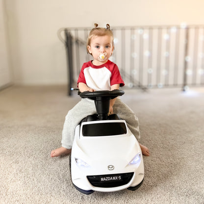 Official Mazda licensed white kids push car with foot-to-floor design, featuring safety side bumpers and interactive steering wheel for toddlers under 2 years old.